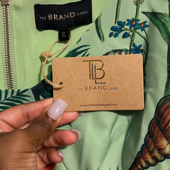 This would be a great dress if you are a woman with a statement it’s above thigh - Picture 2 of 2